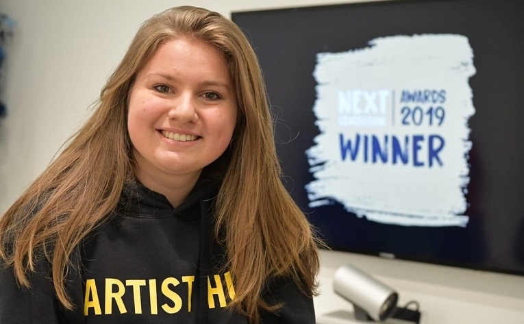 Teenage entrepreneur wins enterprise competition with her idea to help artists earn more money